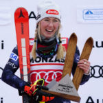 
              The winner United States' Mikaela Shiffrin celebrates after an alpine ski, women's World Cup slalom, in Spindleruv Mlyn, Czech Republic, Saturday, Jan. 28, 2023. (AP Photo/Piermarco Tacca)
            