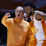 
              Tennessee head coach Rick Barnes talks with guard Josiah-Jordan James (30) during the first half of an NCAA college basketball game against Kentucky, Saturday, Jan. 14, 2023, in Knoxville, Tenn. (AP Photo/Wade Payne)
            