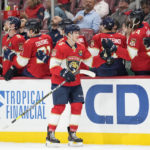 
              Florida Panthers center Anton Lundell (15) celebrates his goal with teammates during the first period of an NHL hockey game against the Minnesota Wild, Saturday, Jan. 21, 2023, in Sunrise, Fla. (AP Photo/Wilfredo Lee)
            