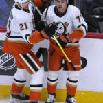
              Anaheim Ducks center Isac Lundestrom, left, congratulates right wing Frank Vatrano, who scored against the Colorado Avalanche during the first period of an NHL hockey game Thursday, Jan. 26, 2023, in Denver. (AP Photo/David Zalubowski)
            