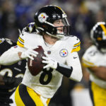 
              Pittsburgh Steelers quarterback Kenny Pickett (8) throws against the Baltimore Ravens in the first half of an NFL football game in Baltimore, Sunday, Jan. 1, 2023. (AP Photo/Nick Wass)
            