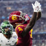 
              Southern California wide receiver Mario Williams misses a pass intended for him during the first half of the Cotton Bowl NCAA college football game against Tulane, Monday, Jan. 2, 2023, in Arlington, Texas. (AP Photo/Sam Hodde)
            
