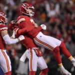 
              Kansas City Chiefs place kicker Harrison Butker (7) is lifted in the air after his game-winning field goal against the Cincinnati Bengals during the second half of the NFL AFC Championship playoff football game, Sunday, Jan. 29, 2023, in Kansas City, Mo. The Chiefs won 23-20. (AP Photo/Jeff Roberson)
            