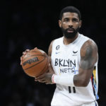 
              Brooklyn Nets' Kyrie Irving (11) looks to pass the ball during the first half of an NBA basketball game against the Oklahoma City Thunder, Sunday, Jan. 15, 2023 in New York. (AP Photo/Frank Franklin II)
            