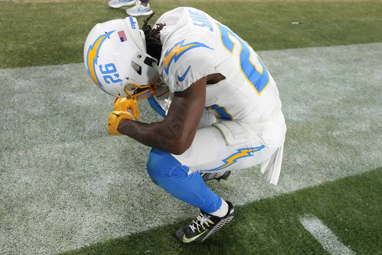 Los Angeles Chargers cornerback Asante Samuel Jr. (26) takes a moment after an NFL wild-card footba...