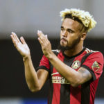 
              FILE - Atlanta United midfielder Anton Walkes (26) acknowledges the fans after an MLS playoff soccer game against Columbus Crew, in Atlanta, Thursday, Oct. 26, 2017. Soccer player Anton Walkes, who started his career at Tottenham, died Thursday, Jan. 19, 2023, after an accident in Florida, his MLS club Charlotte FC said. He was 25.(AP Photo/Danny Karnik, File)
            