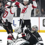 
              New Jersey Devils left wing Tomas Tatar, left, celebrates his goal with center Nico Hischier, center, as Los Angeles Kings goaltender Jonathan Quick looks on during the first period of an NHL hockey game Saturday, Jan. 14, 2023, in Los Angeles. (AP Photo/Mark J. Terrill)
            