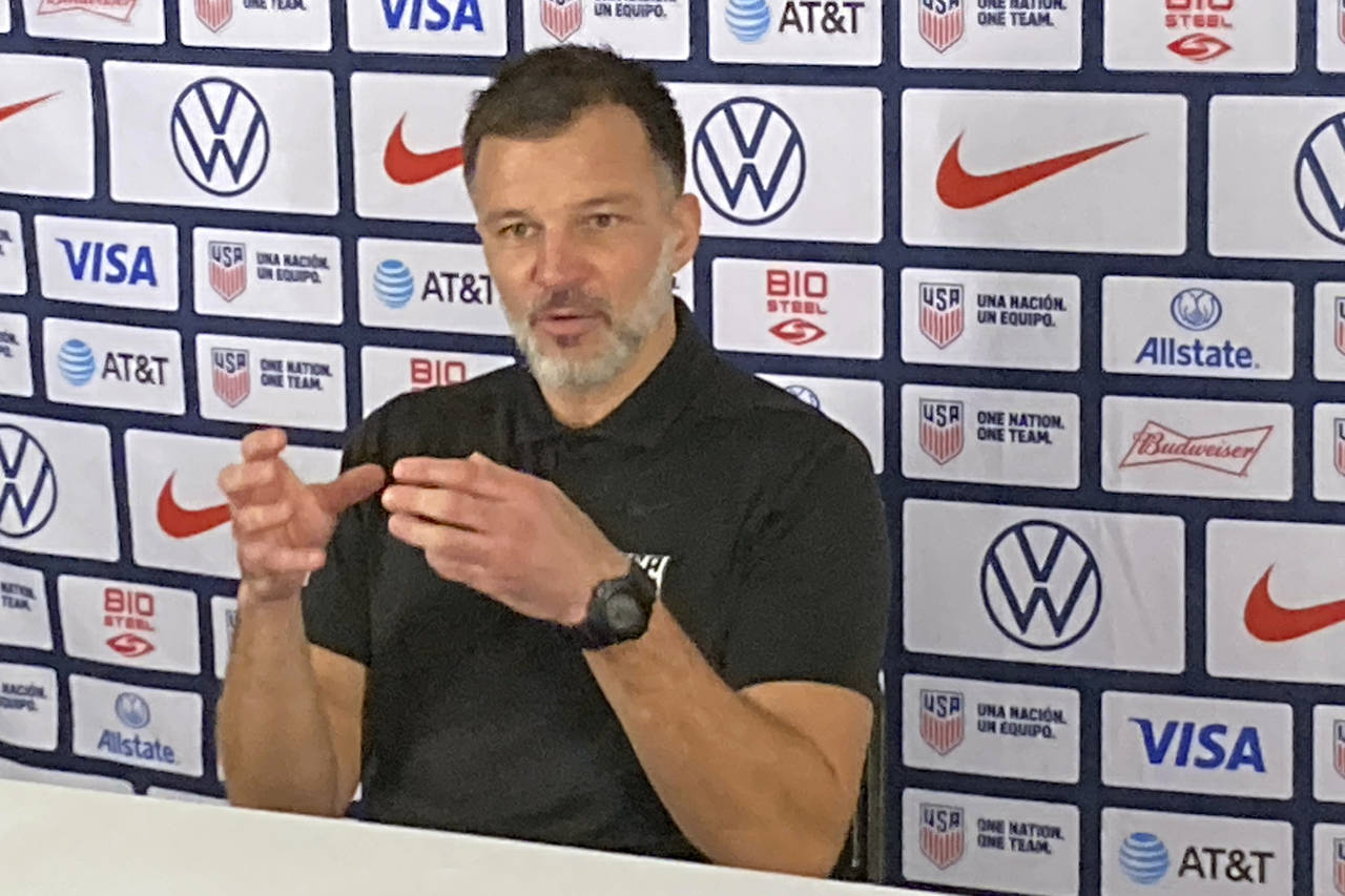 U.S. men’s national team assistant coach Anthony Hudson speaks with reporters following practice ...