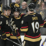
              Vegas Golden Knights center William Karlsson, center, celebrates after scoring against the Edmonton Oilers during the second period of an NHL hockey game Saturday, Jan. 14, 2023, in Las Vegas. (AP Photo/John Locher)
            