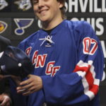 
              FILE - Alexei Cherepanov, of Russia, smiles after being selected by the New York Rangers during the first round of the NHL hockey draft on June 22, 2007, in Columbus, Ohio. Cherepanov died Oct. 13, 2007, during a game in Russia. He was 19. The horror that swept across the NFL when Buffalo BIlls defensive back Damar Hamlin collapsed and went into cardiac arrest during a game this week in Cincinnati was all too familiar to members of the hockey community. (AP Photo/Jay LaPrete, File)
            