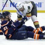 
              New York Islanders center Kyle Palmieri (21) reacts after Anders Lee, behind, scored a goal against the Vegas Golden Knights during the second period of an NHL hockey game Saturday, Jan. 28, 2023, in Elmont, N.Y. (AP Photo/Adam Hunger)
            