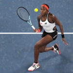 
              Coco Gauff, of the U.S. plays a forehand return to Emma Raducanu of Britain in their second round match at the Australian Open tennis championship in Melbourne, Australia, Wednesday, Jan. 18, 2023. (AP Photo/Aaron Favila)
            