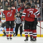 
              New Jersey Devils defenseman Dougie Hamilton (7) celebrates with his teammates after scoring against the Vegas Golden Knights in the third period of an NHL hockey game, Tuesday, Jan. 24, 2023, in Newark, N.J. The Devils won 3-2. (AP Photo/Mary Altaffer)
            