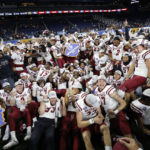 
              New Mexico State players celebrate after defeating Bowling Green in the Quick Lane Bowl NCAA college football game, Monday, Dec. 26, 2022, in Detroit. (AP Photo/Al Goldis)
            