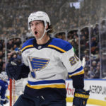 
              St. Louis Blues left wing Brandon Saad (20) celebrates after scoring against the Toronto Maple Leafs during the first period of an NHL hockey game Tuesday, Jan. 3, 2023, in Toronto. (Christopher Katsarov/The Canadian Press via AP)
            