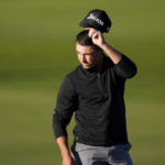 
              Brent Grant reacts after finishing on the 18th hole of the North Course at Torrey Pines during the first round of the Farmers Insurance Open golf tournament, Wednesday, Jan. 25, 2023, in San Diego. (AP Photo/Gregory Bull)
            