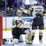 
              Vegas Golden Knights goaltender Logan Thompson and Chandler Stephenson (20) react after giving up a goal to New York Islanders center Mathew Barzal, not seen, in overtime an NHL hockey game Saturday, Jan. 28, 2023, in Elmont, N.Y. The Islanders won 2-1 in overtime. (AP Photo/Adam Hunger)
            