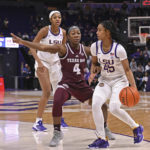 
              Texas A&M's Kay Kay Green (4) defends against LSU guard Alexis Morris (45) during an NCAA college basketball game Thursday, Jan. 5, 2023, in Baton Rouge, La. (Hilary Scheinuk/The Advocate via AP)
            