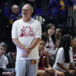 
              Arkansas head coach Mike Neighbors responds to a call by an official in the second half an NCAA college basketball game against LSU in Baton Rouge, La., Thursday, Jan. 19, 2023. LSU won 79-76. (AP Photo/Gerald Herbert)
            