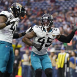 
              Jacksonville Jaguars linebacker K'Lavon Chaisson (45) celebrates with teammate Josh Allen (41) after he sacked Houston Texans quarterback Jeff Driskel during the second half of an NFL football game in Houston, Sunday, Jan. 1, 2023. (AP Photo/Eric Christian Smith)
            