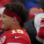 
              Kansas City Chiefs quarterback Patrick Mahomes (15) sits on the bench during the first half of an NFL divisional round playoff football game between the Kansas City Chiefs and the Jacksonville Jaguars, Saturday, Jan. 21, 2023, in Kansas City, Mo. (AP Photo/Ed Zurga)
            