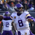 
              Minnesota Vikings quarterback Kirk Cousins (8) throws a pass during the first half of an NFL football game against the Chicago Bears, Sunday, Jan. 8, 2023, in Chicago. (AP Photo/Nam Y. Huh)
            