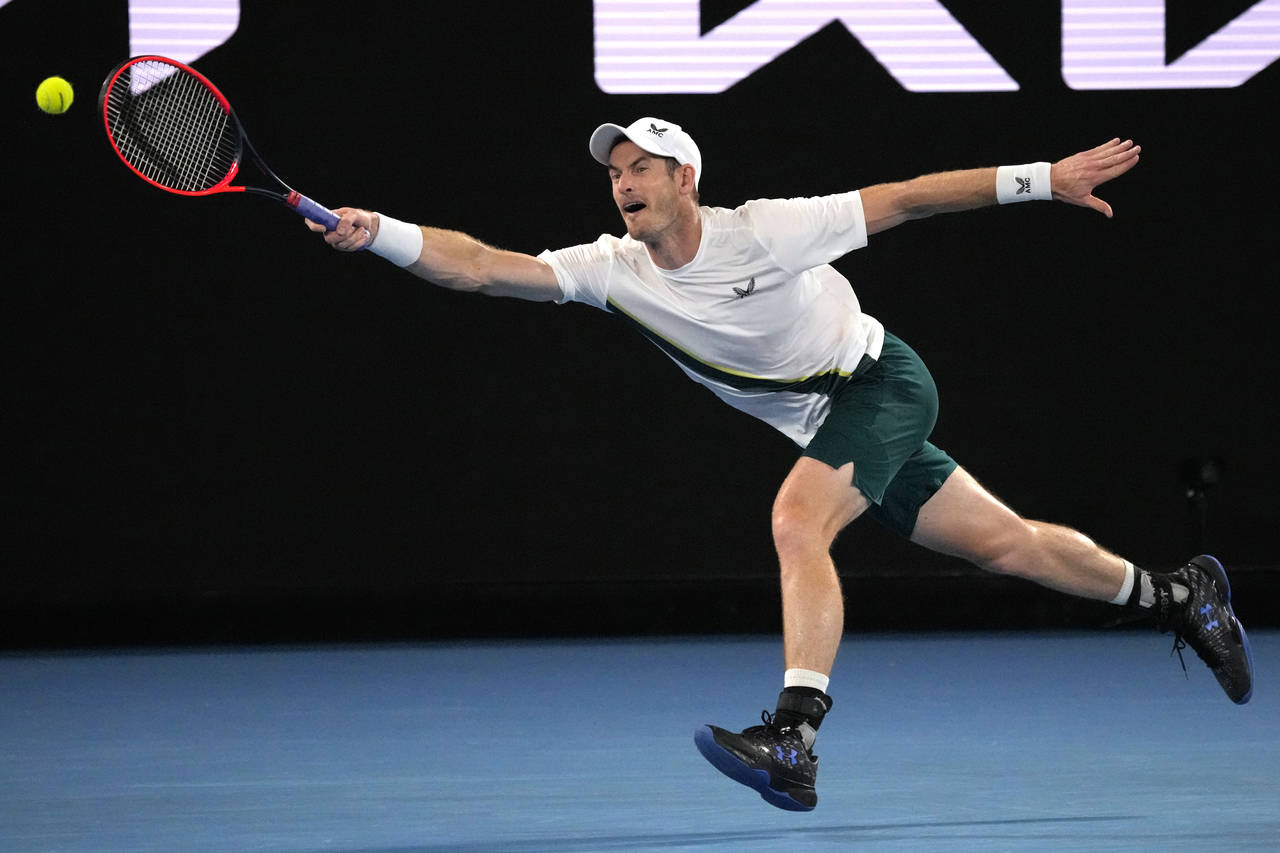 Andy Murray of Britain plays a forehand return to Matteo Berrettini of Italy during their first rou...