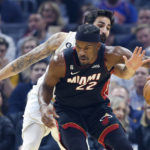 
              Miami Heat forward Jimmy Butler (22) plays against Cleveland Cavaliers guard Ricky Rubio during the first half of an NBA basketball game, Tuesday, Jan. 31, 2023, in Cleveland. (AP Photo/Ron Schwane)
            