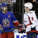 
              New York Rangers left wing Chris Kreider (20) talks to Washington Capitals left wing Alex Ovechkin (8) after being called for a holding penalty against Ovechkin during the first period of an NHL hockey game Tuesday, Dec. 27, 2022, in New York. (AP Photo/Adam Hunger)
            