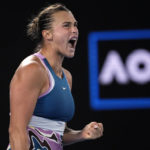 
              Aryna Sabalenka of Belarus reacts after winning a point against Magda Linette of Poland during their semifinal match at the Australian Open tennis championship in Melbourne, Australia, Thursday, Jan. 26, 2023. (AP Photo/Aaron Favila)
            