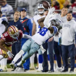 
              Dallas Cowboys wide receiver CeeDee Lamb (88) catches a pass in front of San Francisco 49ers cornerback Deommodore Lenoir (38) during the second half of an NFL divisional round playoff football game in Santa Clara, Calif., Sunday, Jan. 22, 2023. (AP Photo/Tony Avelar)
            