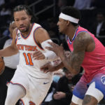 
              New York Knicks guard Jalen Brunson (11) drives against Washington Wizards guard Bradley Beal during the first half of an NBA basketball game Wednesday, Jan. 18, 2023, at Madison Square Garden in New York. (AP Photo/Mary Altaffer)
            