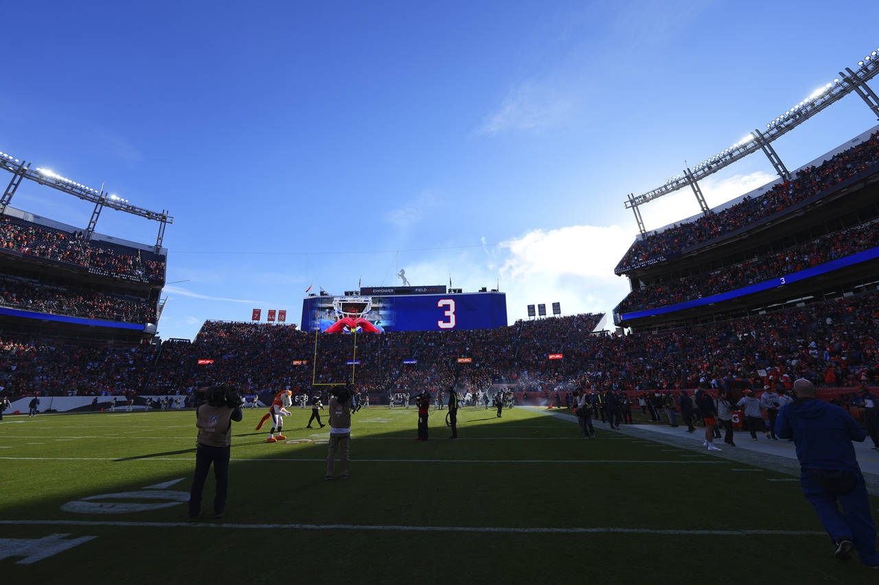 Buffalo Bills safety Damar Hamlin is honored before an NFL football game between the Denver Broncos...