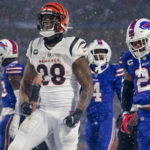 
              Cincinnati Bengals running back Joe Mixon (28) reacts after carrying the ball against the Buffalo Bills during the third quarter of an NFL division round football game, Sunday, Jan. 22, 2023, in Orchard Park, N.Y. (AP Photo/Joshua Bessex)
            