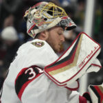 
              Ottawa Senators goaltender Anton Forsberg reacts after giving up a goal to Colorado Avalanche center Alex Newhook in the first period of an NHL hockey game Saturday, Jan. 14, 2023, in Denver. (AP Photo/David Zalubowski)
            