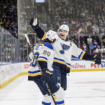 
              St. Louis Blues left wing Brandon Saad (20) celebrates his goal against the Toronto Maple Leafs with defenseman Colton Parayko (55) during the first period of an NHL hockey game Tuesday, Jan. 3, 2023, in Toronto. (Christopher Katsarov/The Canadian Press via AP)
            