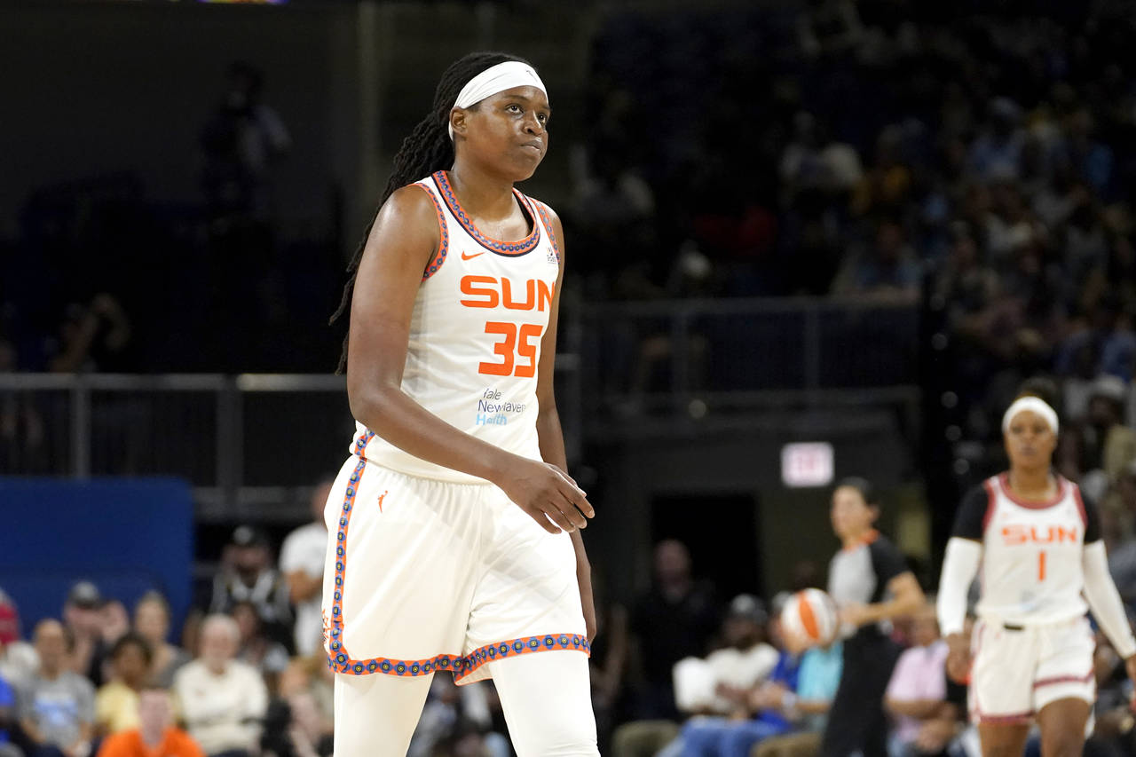 FILE - Connecticut Sun's Jonquel Jones walks down court during the second half of Game 5 in a WNBA ...