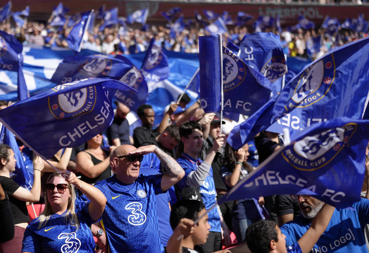 FILE - Chelsea fans support their team before the English FA Cup final soccer match between Chelsea...