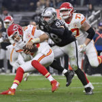 Patrick Mahomes sets record, Chiefs beat Raiders for AFC's top seed