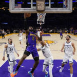 
              Los Angeles Lakers forward LeBron James (6) shoots against Memphis Grizzlies forward Ziaire Williams (8) during the first half of an NBA basketball game in Los Angeles, Friday, Jan. 20, 2023. (AP Photo/Ashley Landis)
            