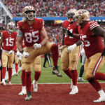 
              San Francisco 49ers tight end George Kittle (85) celebrates after scoring on a two point conversion during the second half of an NFL wild card playoff football game against the Seattle Seahawks in Santa Clara, Calif., Saturday, Jan. 14, 2023. (AP Photo/Jed Jacobsohn)
            