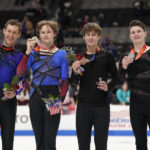 
              Jason Brown, Ilia Malinin, Andrew Torgashev and Maxim Naumov, from left, hold their medals after the men's free skate at the U.S. figure skating championships in San Jose, Calif., Sunday, Jan. 29, 2023. Malinin finished first, Brown finished second, Torgashev finished third and Naumov finished fourth in the event. (AP Photo/Tony Avelar)
            