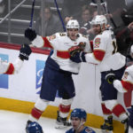
              Florida Panthers left wing Matthew Tkachuk, second from left, celebrates his goal against the Colorado Avalanche with, from left, Sam Reinhart, Aleksander Barkov and Sam Bennett during the third period of an NHL hockey game Tuesday, Jan. 10, 2023, in Denver. (AP Photo/David Zalubowski)
            
