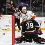 
              Anaheim Ducks right wing Troy Terry (19) scores a goal against Arizona Coyotes goaltender Connor Ingram (39) as referee Peter MacDougall makes the call during the second period of an NHL hockey game in Tempe, Ariz., Tuesday, Jan. 24, 2023. (AP Photo/Ross D. Franklin)
            