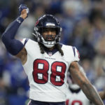 
              Houston Texans tight end Jordan Akins reacts after scoring on a 28-yard touchdown pass during the second half of an NFL football game between the Houston Texans and Indianapolis Colts, Sunday, Jan. 8, 2023, in Indianapolis. (AP Photo/AJ Mast)
            