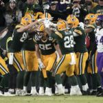 
              Green Bay Packers tight end Robert Tonyan (85) celebrates with teammates after catching a touchdown pass during the first half of an NFL football game against the Minnesota Vikings, Sunday, Jan. 1, 2023, in Green Bay, Wis. (AP Photo/Morry Gash)
            