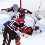 
              Chicago Blackhawks' Isaak Phillips (41) watches his shot go wide of the net as Colorado Avalanche goaltender Pavel Francouz defends during the second period of an NHL hockey game Thursday, Jan. 12, 2023, in Chicago. (AP Photo/Charles Rex Arbogast)
            