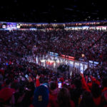 
              Fans light up the stands with cell phone flashlights during the first half an NCAA college basketball game between Colorado State and New Mexico in Albuquerque, N.M., Wednesday, Dec. 28, 2022. (Chancey Bush/The Albuquerque Journal via AP)
            