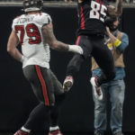 
              Atlanta Falcons tight end MyCole Pruitt (85) catches the ball for a touchdown during the first half of an NFL football game against Tampa Bay Buccaneers, Sunday, Jan. 8, 2023, in Atlanta. (AP Photo/John Bazemore)
            