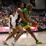 
              Stanford forward Kiki Iriafen, left, defends against Oregon center Phillipina Kyei during the first half of an NCAA college basketball game Sunday, Jan. 29, 2023, in Stanford, Calif. (AP Photo/Josie Lepe)
            